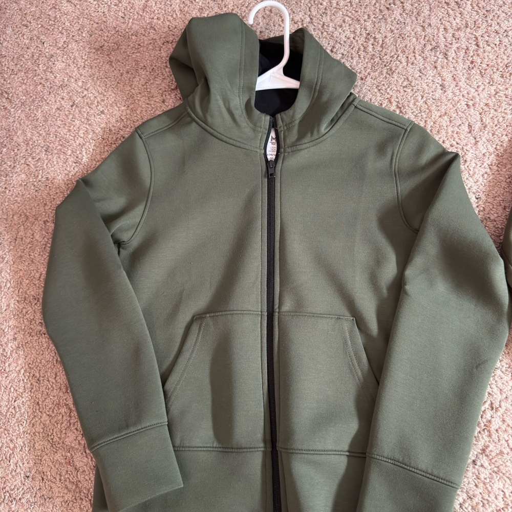 Green zip up tech jacket